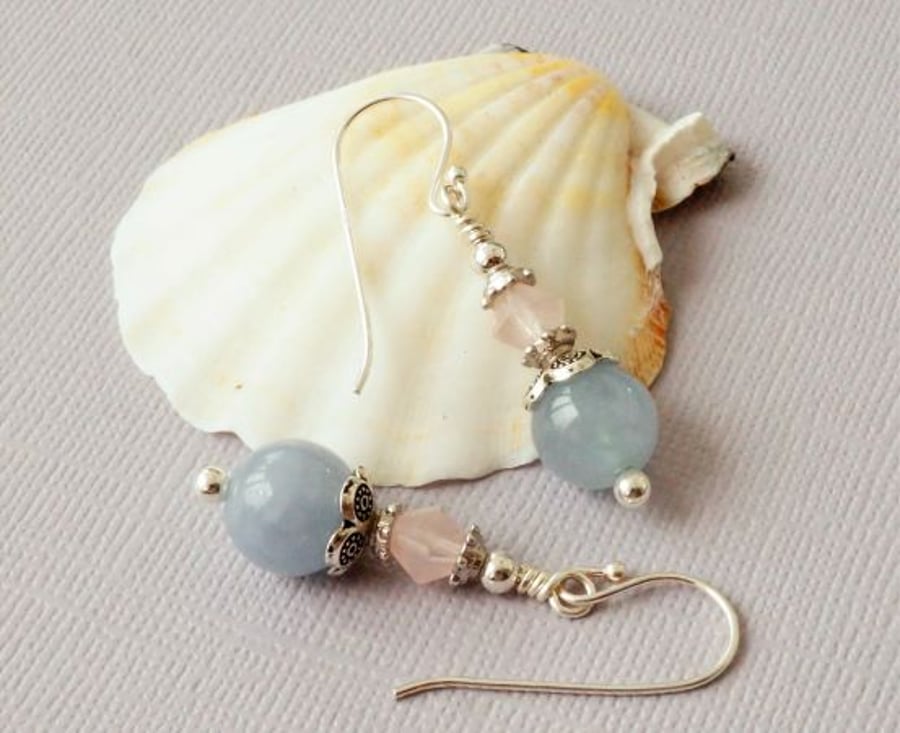 Pastel blue and pink gemstone earrings.