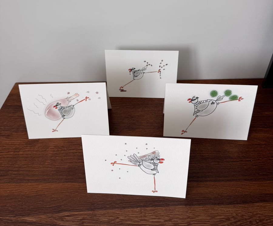 Pack of Four Food Stealing Seagulls Christmas Cards. 