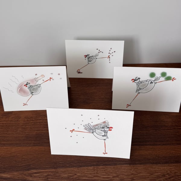 Pack of Four Food Stealing Seagulls Christmas Cards. 
