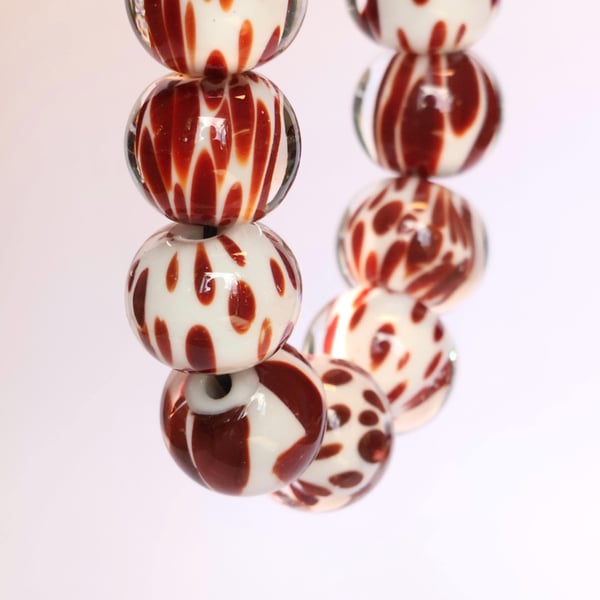 Handmade brown cow print patterned lamp work glass beads