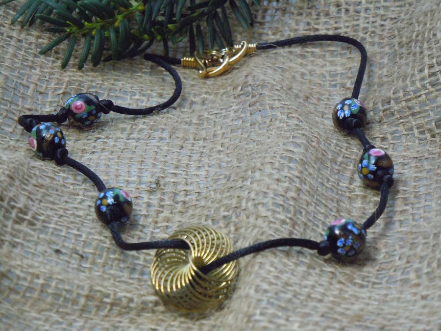 Artisan Lampwork black beads with flower design 