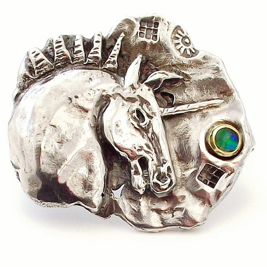 Handmade sculpted Unicorn brooch made from solid sterling silver with an opal