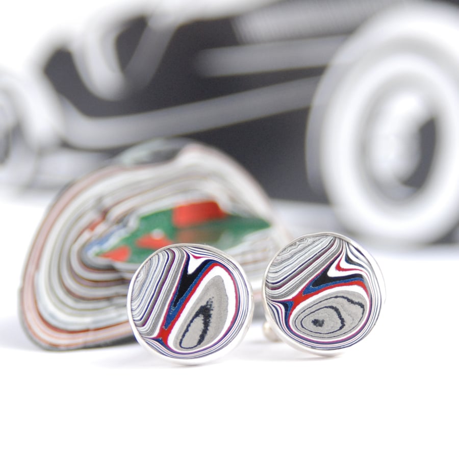 Round Fordite cufflinks - silver with a hint of red