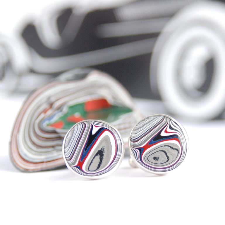 Round Fordite cufflinks - silver with a hint of red