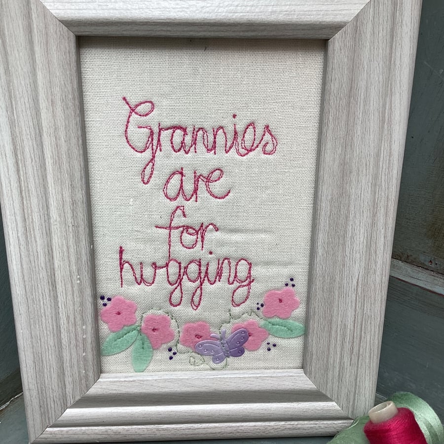 Grannies are for hugging.Machine embroidered picture.