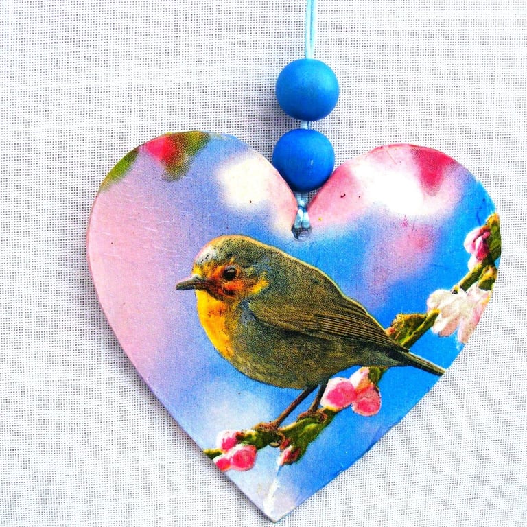 Robin Decoupaged wooden heart wall decoration.
