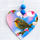 Robin Decoupaged wooden heart wall decoration.