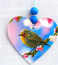Robin Decoupaged wooden heart wall decoration.