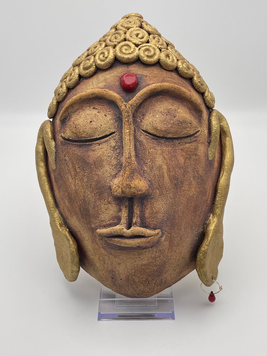 Tranquil buddha wall sculpture