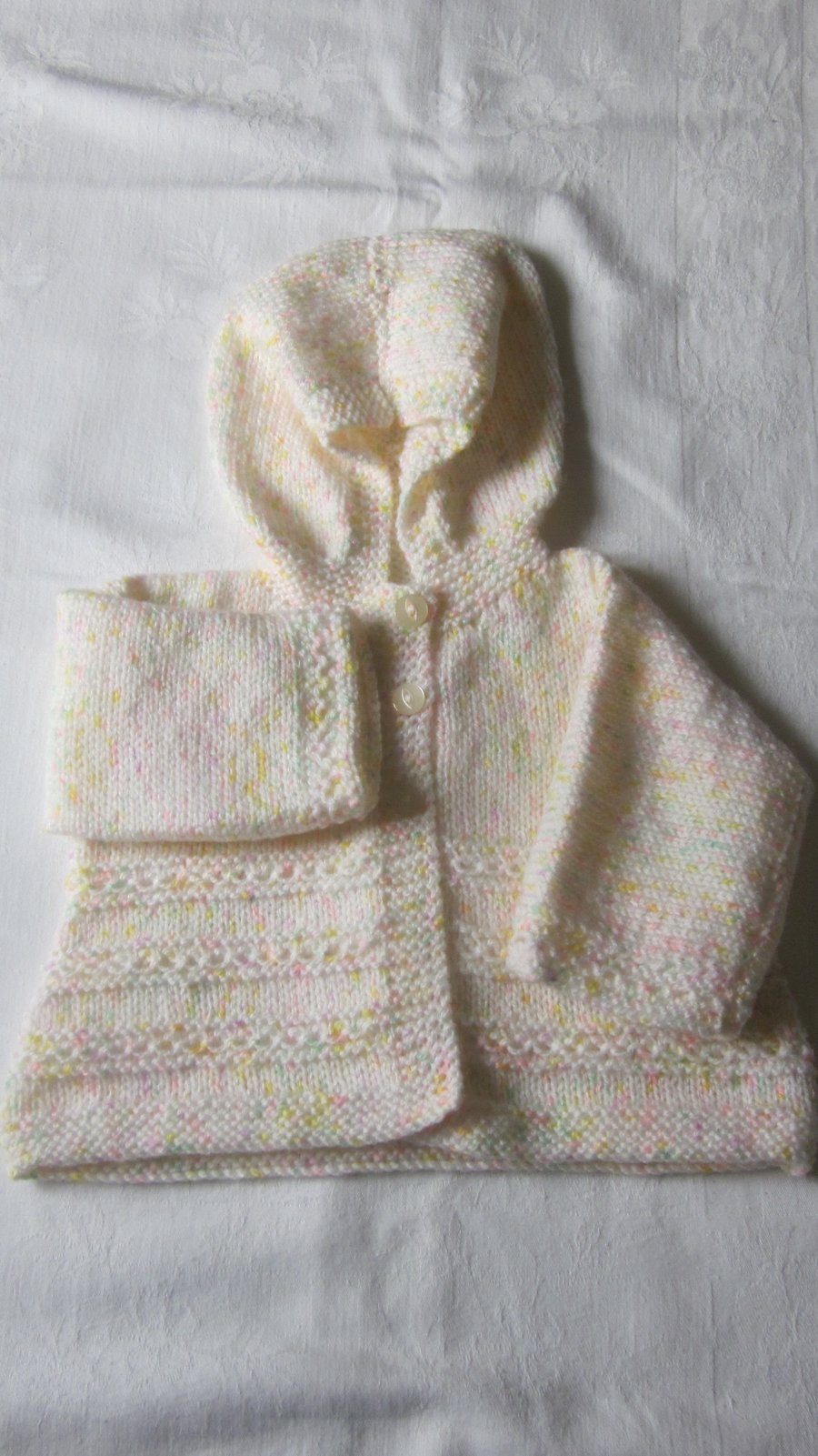 Hooded jacket in cream fleck yarn to fit 22" chest