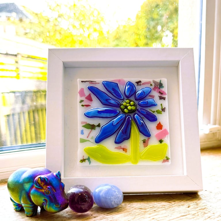 Framed, colourful fused glass abstract flower 