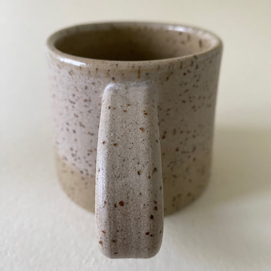 Little speckled clay cup.