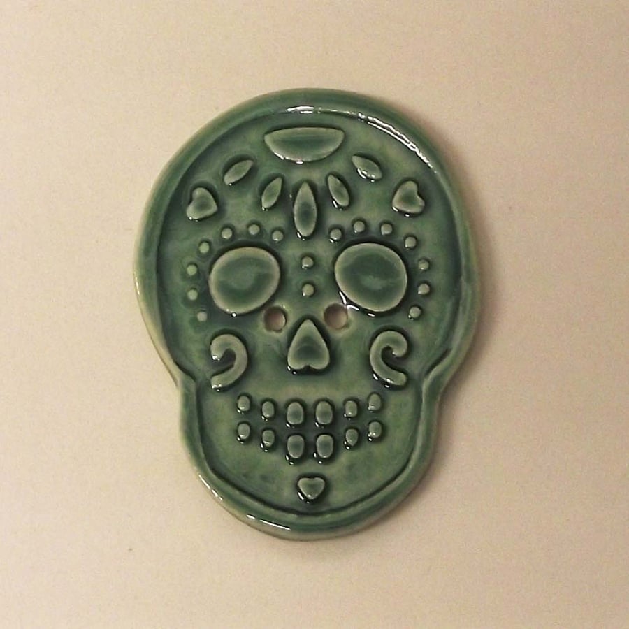 Ceramic skull button sea green Pottery