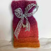 Unique knitted gift bag with silver butterfly