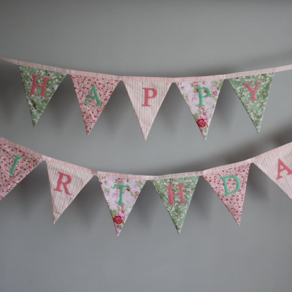 'Happy Birthday' bunting in shades of pinks and greens