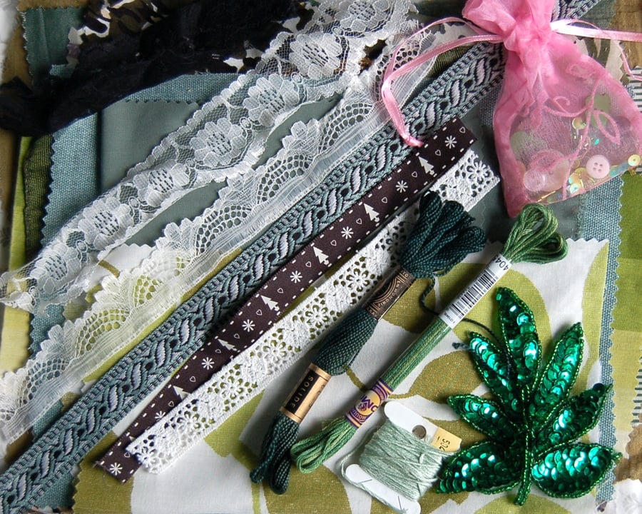 Upcycled slow stitching kit includes fabric, buttons, thread, lace, ribbon