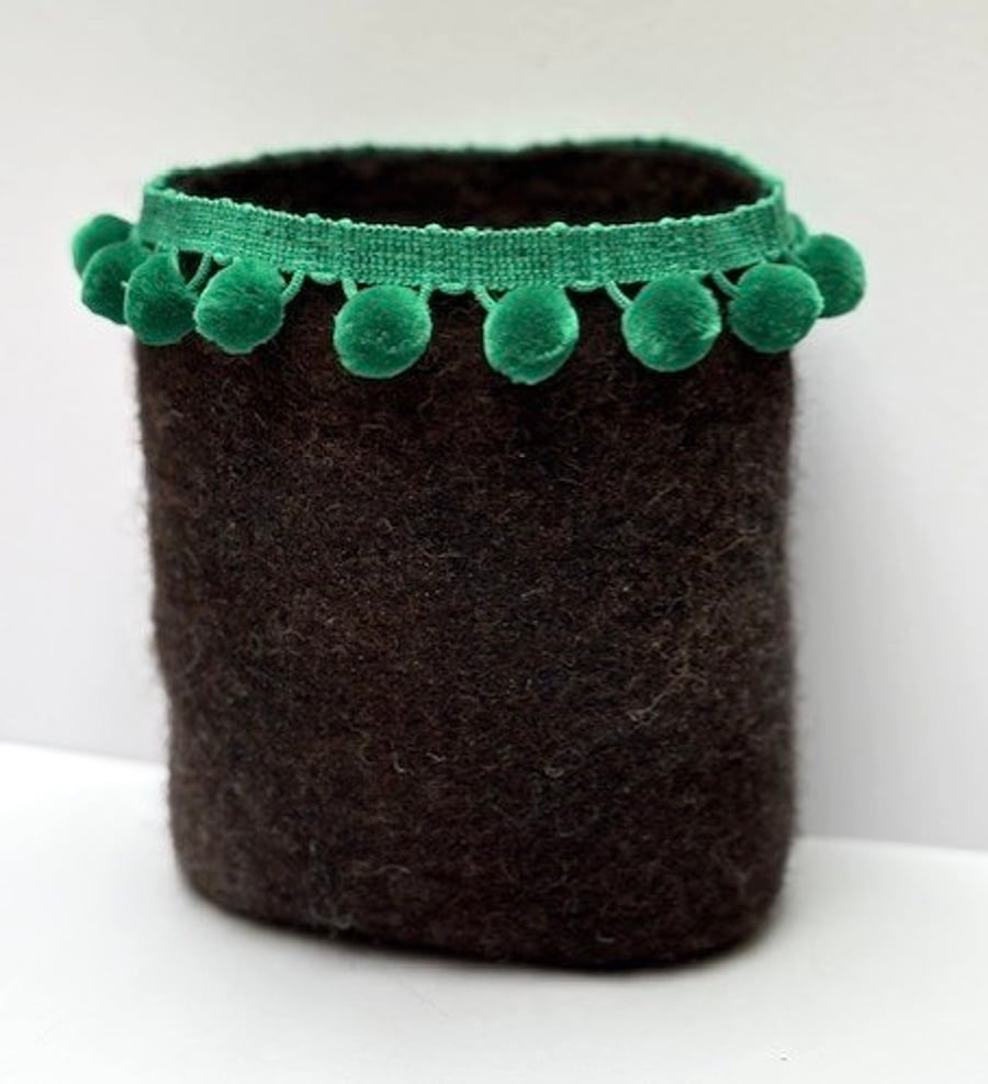 Chocolate brown plant pot holder.