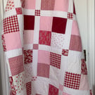 Pretty in pink and red patchwork single bed size quilt 