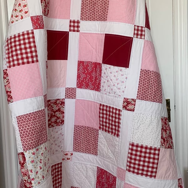 Pretty in pink and red patchwork single bed size quilt 