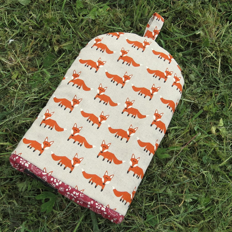 A coffee cosy, size small.  Foxes.  To fit a 2 cup cafetiere.