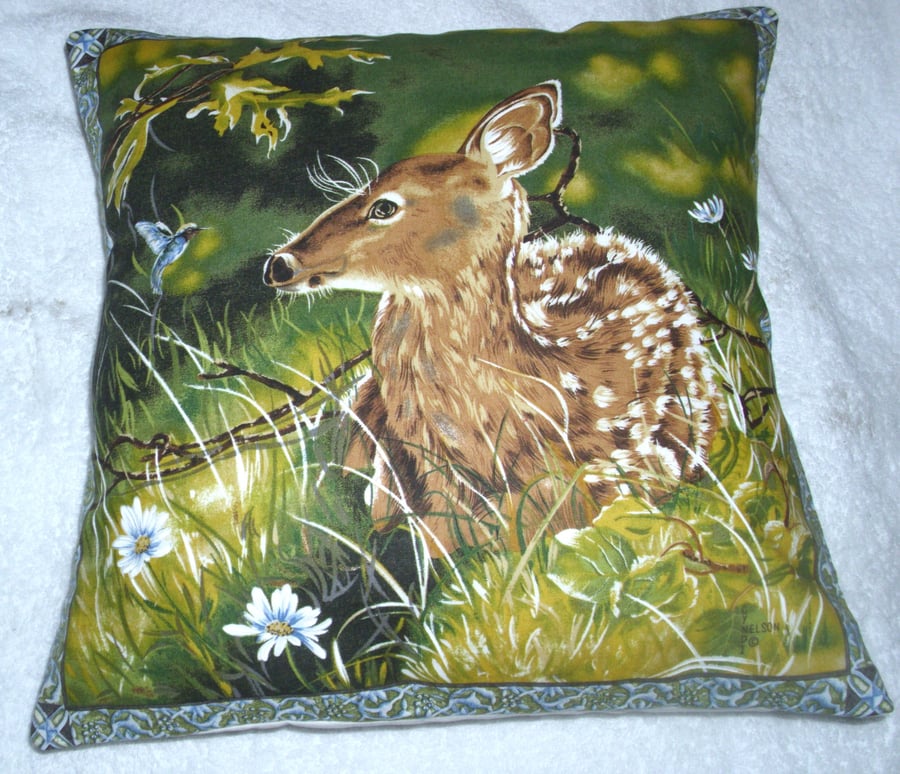 A young Fawn in the long grass cushion