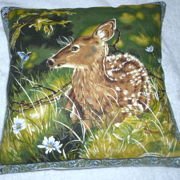 A young Fawn in the long grass cushion