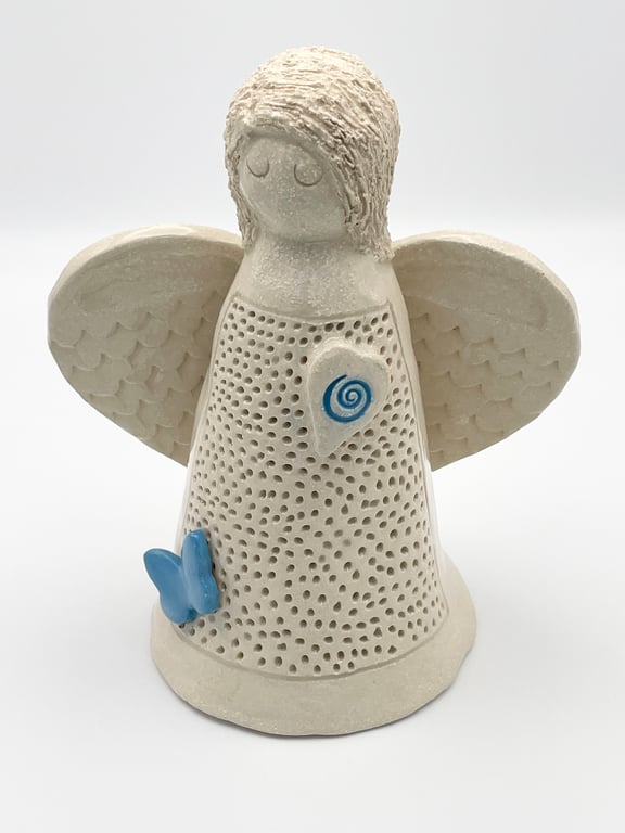 Angel sculpture  with aqua-blue heart and butterfly