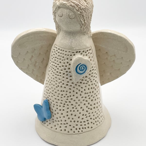 Angel sculpture  with aqua-blue heart and butterfly