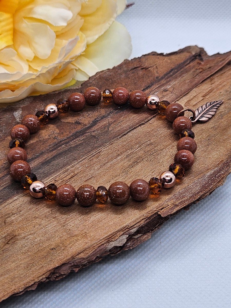 Goldstone copper and crystal stretch bracelet with leaf charm