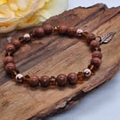 Goldstone copper and crystal stretch bracelet with leaf charm