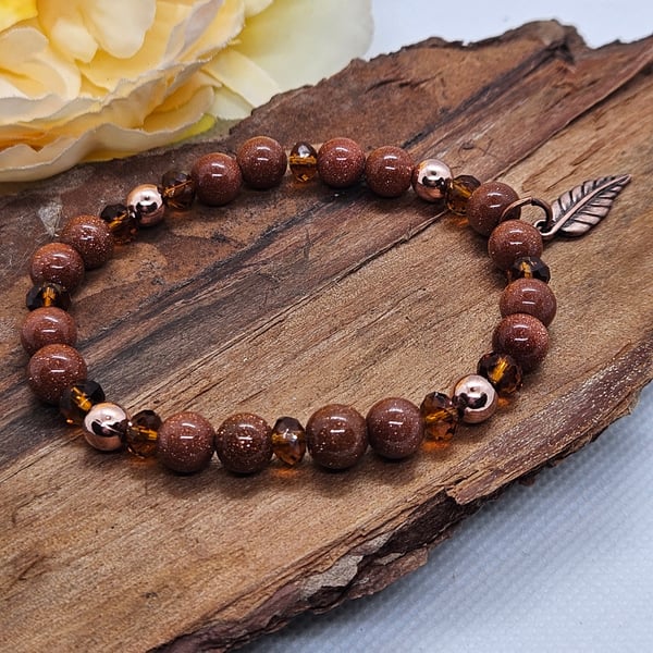 Goldstone copper and crystal stretch bracelet with leaf charm