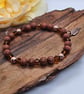 Goldstone copper and crystal stretch bracelet with leaf charm