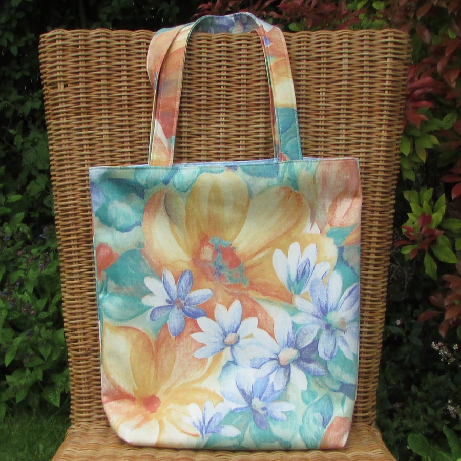 Tote bag with orange, blue and green floral pattern