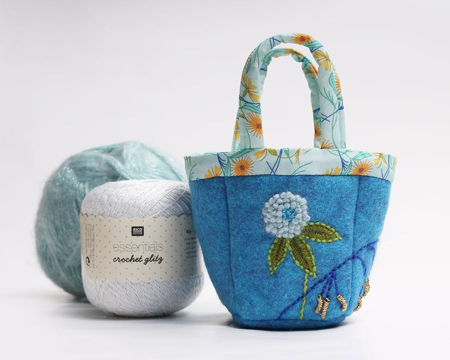 Tiny turquoise felt bag with clover and bluebell embroidery