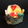ceramic tea light holder with bird, heart and flower