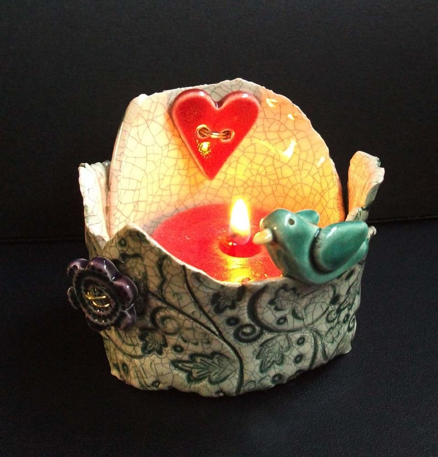 ceramic tea light holder with bird, heart and flower