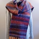 Multi colour scarf in reds and blues