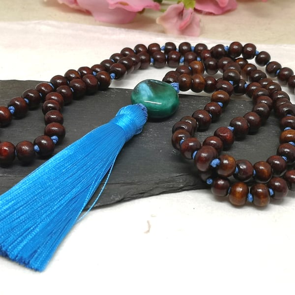 Wooden mala 108 bead necklace with ceramic focal and blue tassel
