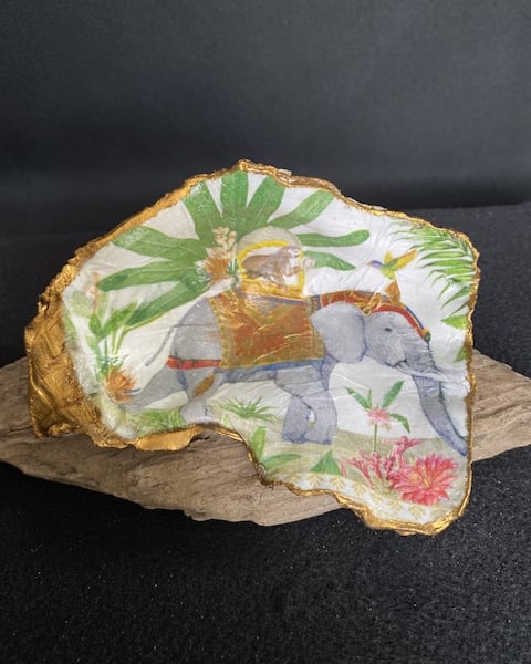 A stunning large hand decorated oyster shell