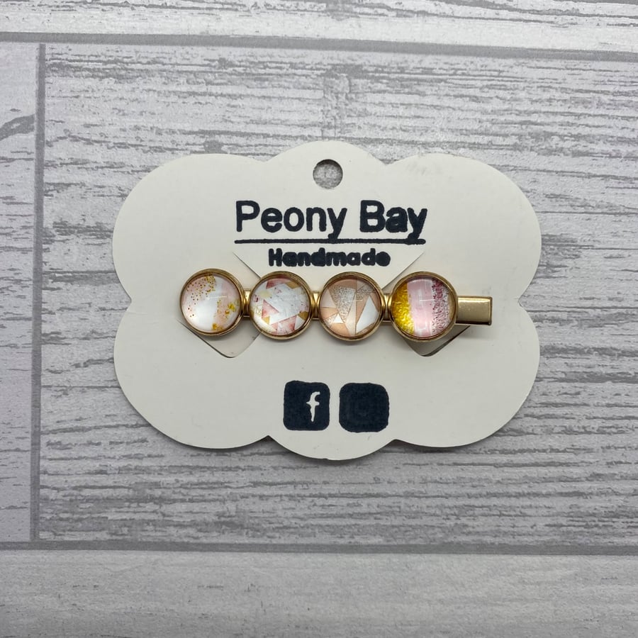 Alligator clip in pink and gold