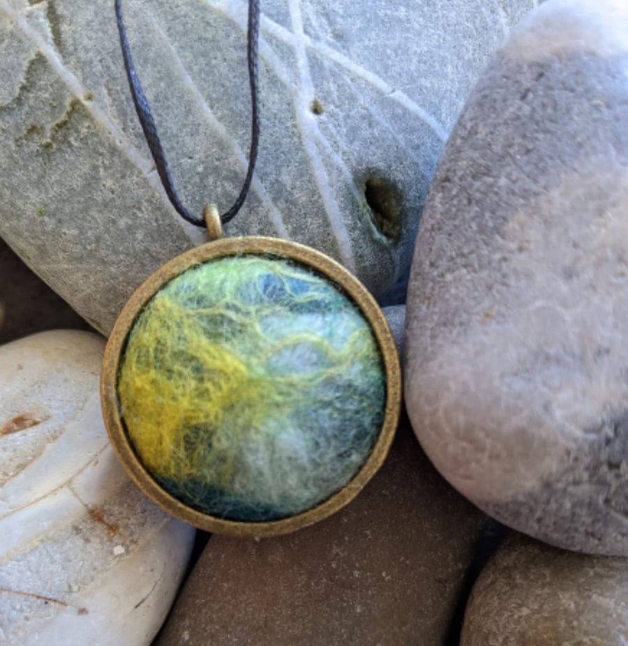 Felted pendant - greens, hint of yellow in bronze bezel