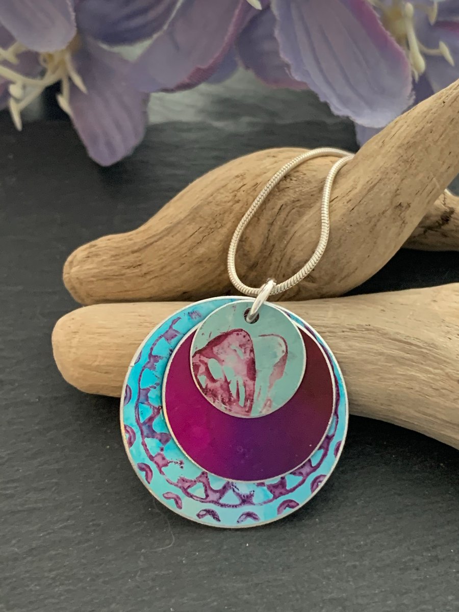 Hand dyed aluminium pendant, turquoise and dark pink mandala design 