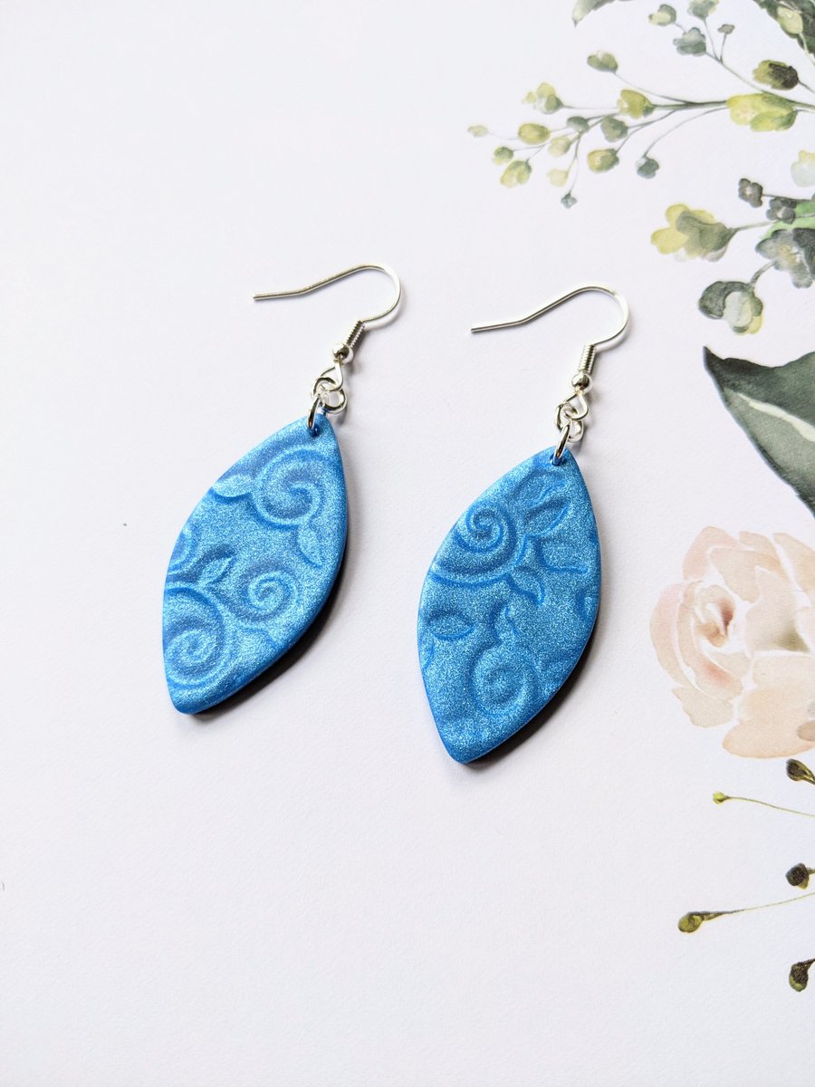 Blue swirl illusion earrings in a pointed oval shape, Polymer Clay 