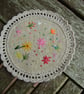 Round embroidered and reversible fabric coasters. - Image 3