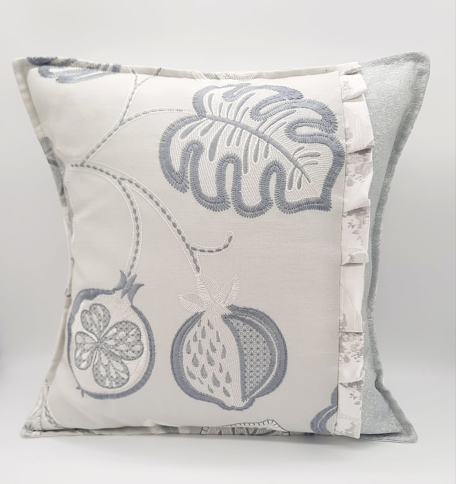 Pastel green 16" envelope backed cushion with frill detail.  