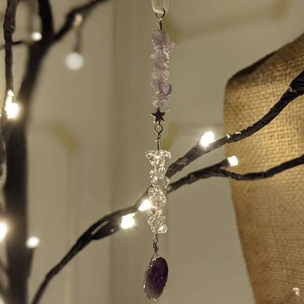 Christmas tree decorations with light catching crystals