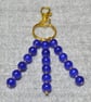 Bag Charm – Blue Glass Bead and Gold Spacer Triple Dangle