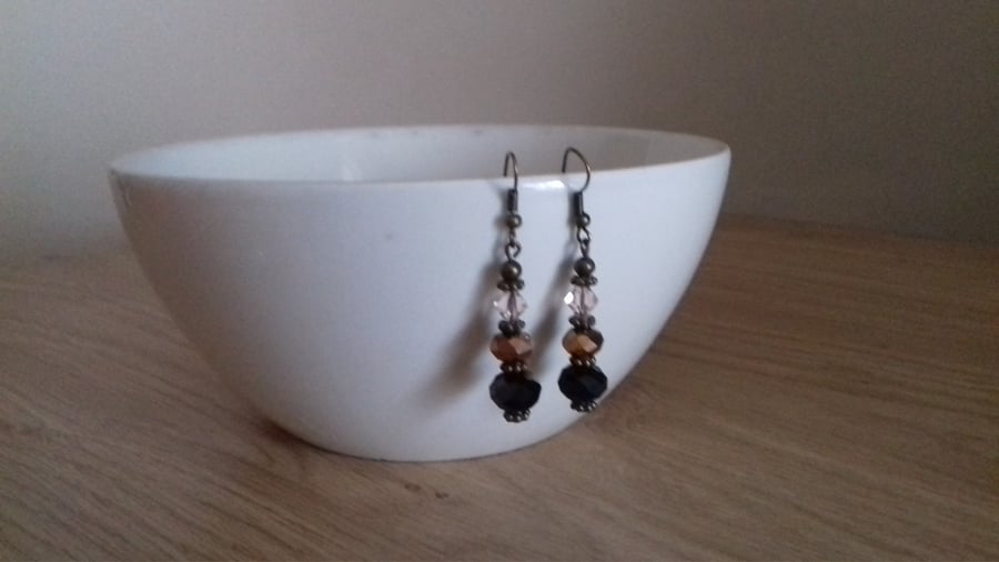 BLACK, BRONZE, CHAMPAGNE AND ANTIQUE BRONZE EARRINGS.