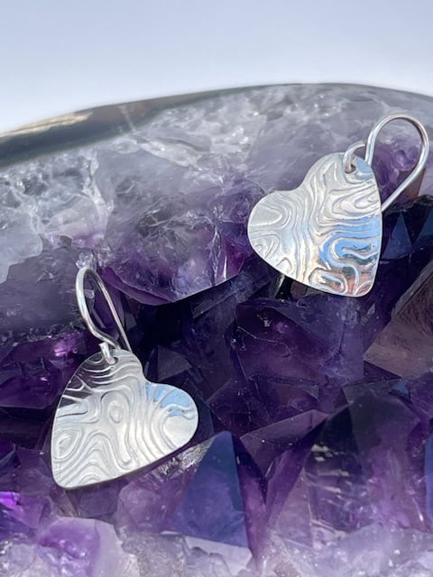 Heart silver round earrings with texture