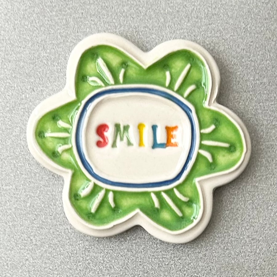 Large Smile pottery magnet green